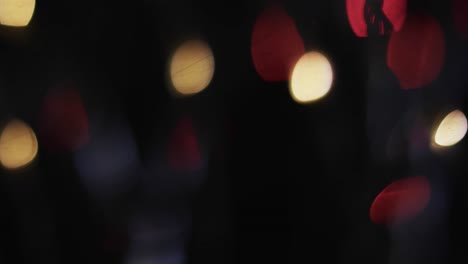 video de puntos de luz bokeh multicolores parpadeantes con espacio para copiar