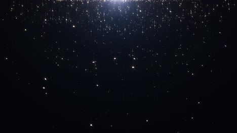 el fondo de partículas de brillo que caen