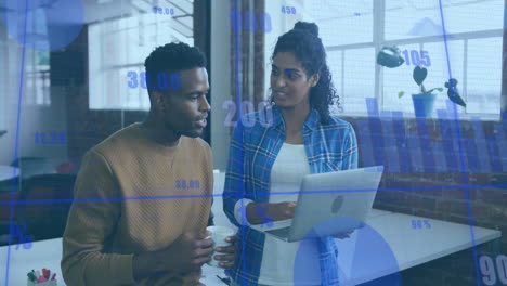 discussing data with digital charts overlay, two people in modern office