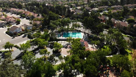 Aerial-approach-and-fly-over-of-a-community-pool