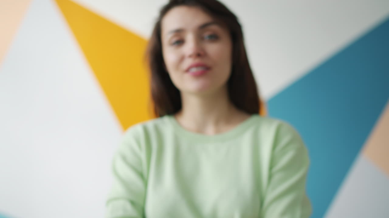 Woman in a Green Sweater, Colorful Background