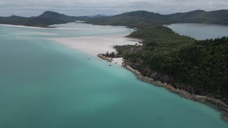 bird's eye view of famous whitehaven beach and hill inlet - whitsunday island near great barrier reef in qld, australia