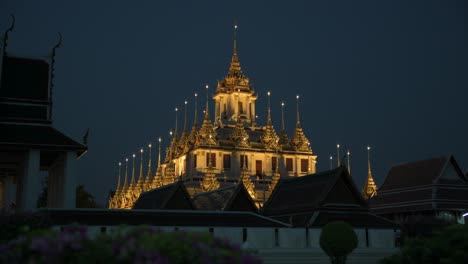 a 4k video of loha prasat at night, bangkok, thailand