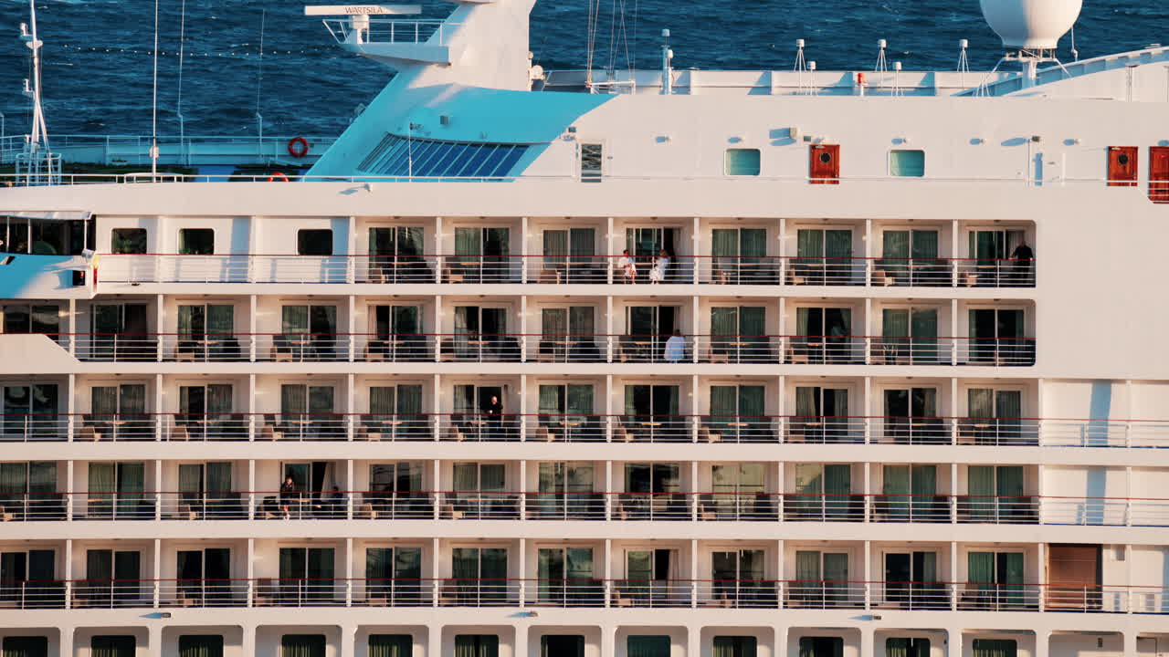 Large cruise ship docked in the Monaco Marina in the evening