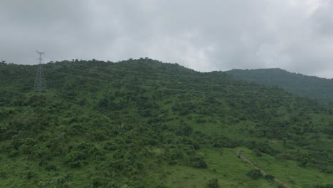 aerial - beautiful hillside on a cloudy day, panning shot