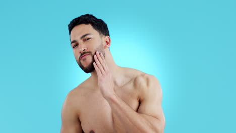 Hands-on-face,-beard-and-skincare-of-man-in-studio