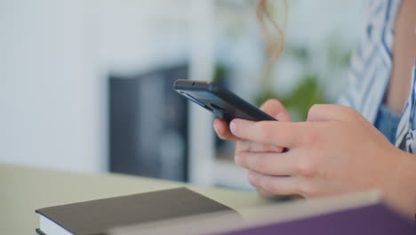 Close-Up-of-Woman-Texting-on-Smartphone