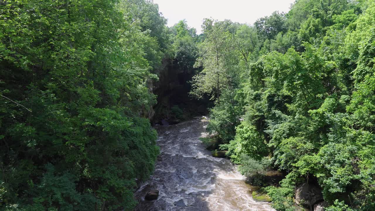 Whitewater rapids rush through the rocky gorge of the Cuyahoga River at High Bridge Glens in Summit County, Ohio — a restored natural escape near Akron and Cuyahoga Falls.