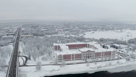 Red-castle-in-winter.-Revealing-shoot.-Latvia,-Jelgava