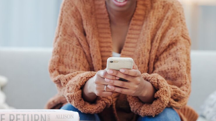 Woman sending a text message