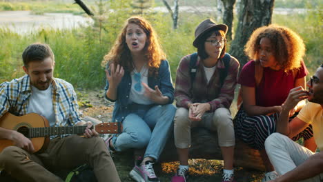 friends singing and having fun in nature
