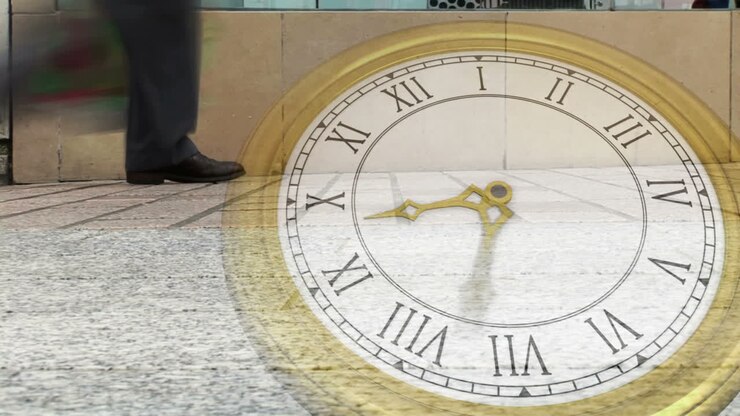 Roman numeral clock over busy street