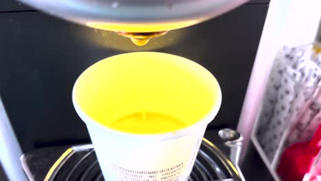the art of espresso: skilled hands grind beans, tamp the grounds, and expertly operate the machine