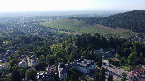 Aerial-view-over-Badenweiler-castle-and-Schlossplatz-of-spa-town-in-Germany