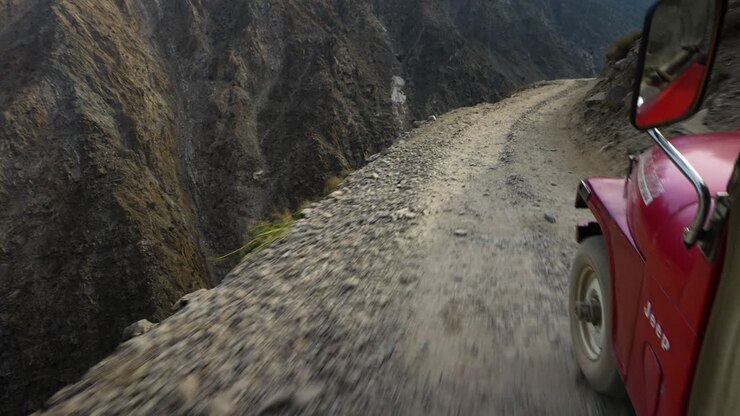 Driving in a jeep on the mountainside towards Fairy Meadows in Pakistan