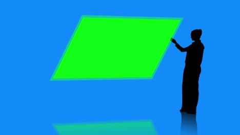 Silhouette-of-businesswoman-presenting-chroma-key