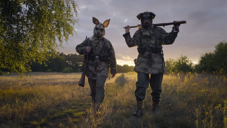 soldiers in animal masks at sunset