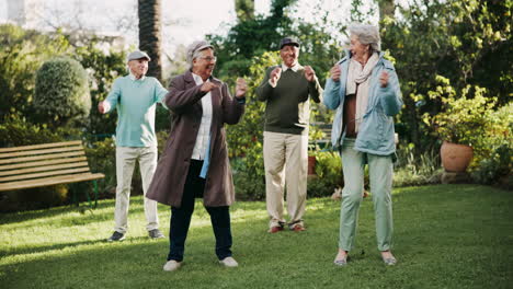 group of senior citizens dancing in the garden