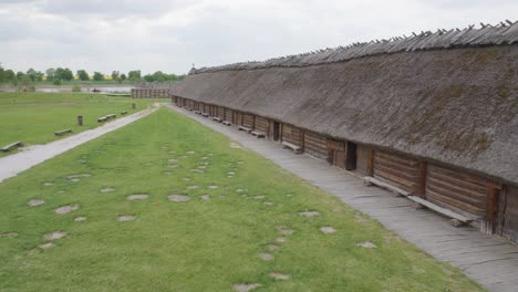 inside an archaeological site of biskupin and a life-size model of a late bronze age fortified settlement in poland