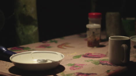 dinner table ready in a remote coastal home at the darien gap in colombia.