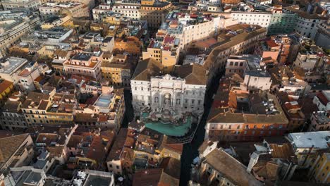 drone orbits high above trevi fountain