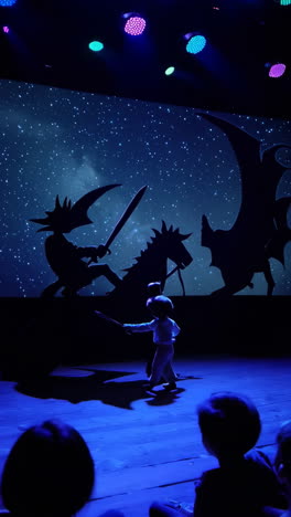 child's fantasy adventure on stage with shadow projections