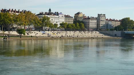 Lyon France. People relax on the embankment of the river Rhône