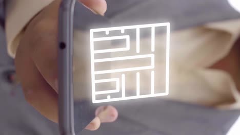 la animación de la tabla de números gráficos aparece en un teléfono móvil sostenido por una persona en un traje
