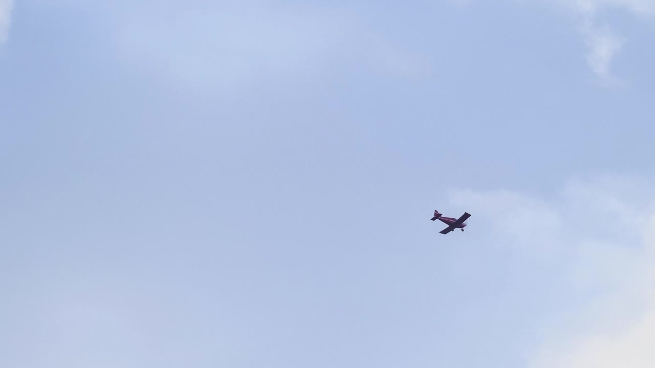 Small aircraft on blue sky, copy space