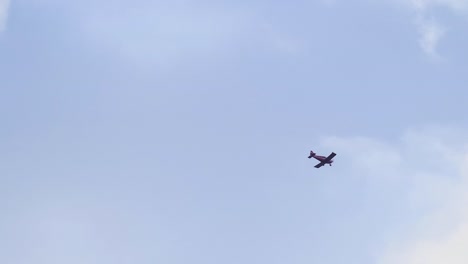 Small-aircraft-on-blue-sky,-copy-space