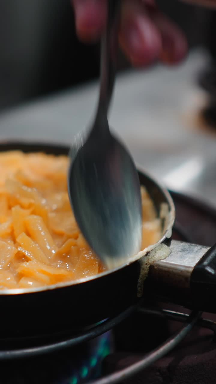 Close-up of omelette cooking in a pan