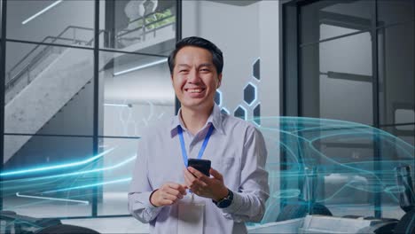 businessman using smartphone in modern office with car design background