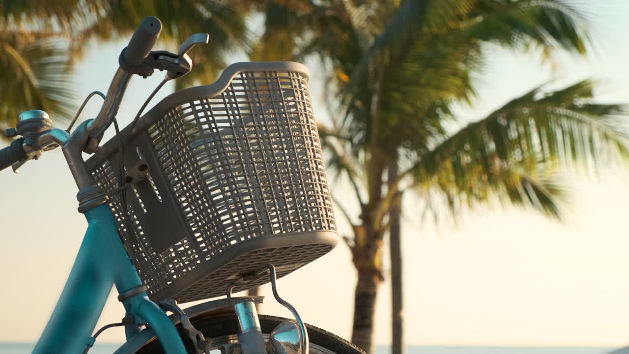 Blue Bicycle on a Beach at Sunset