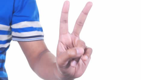 hand showing peace sign