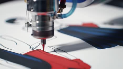 precision artistry: a close-up look at the intricate process of a laser engraving machine crafting detailed illustrations on paper