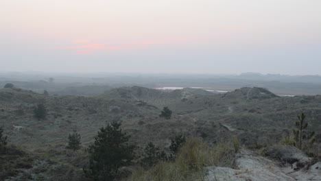 Background-of-sunset-or-sunrise-over-wild-hills-at-dusk-or-dawn