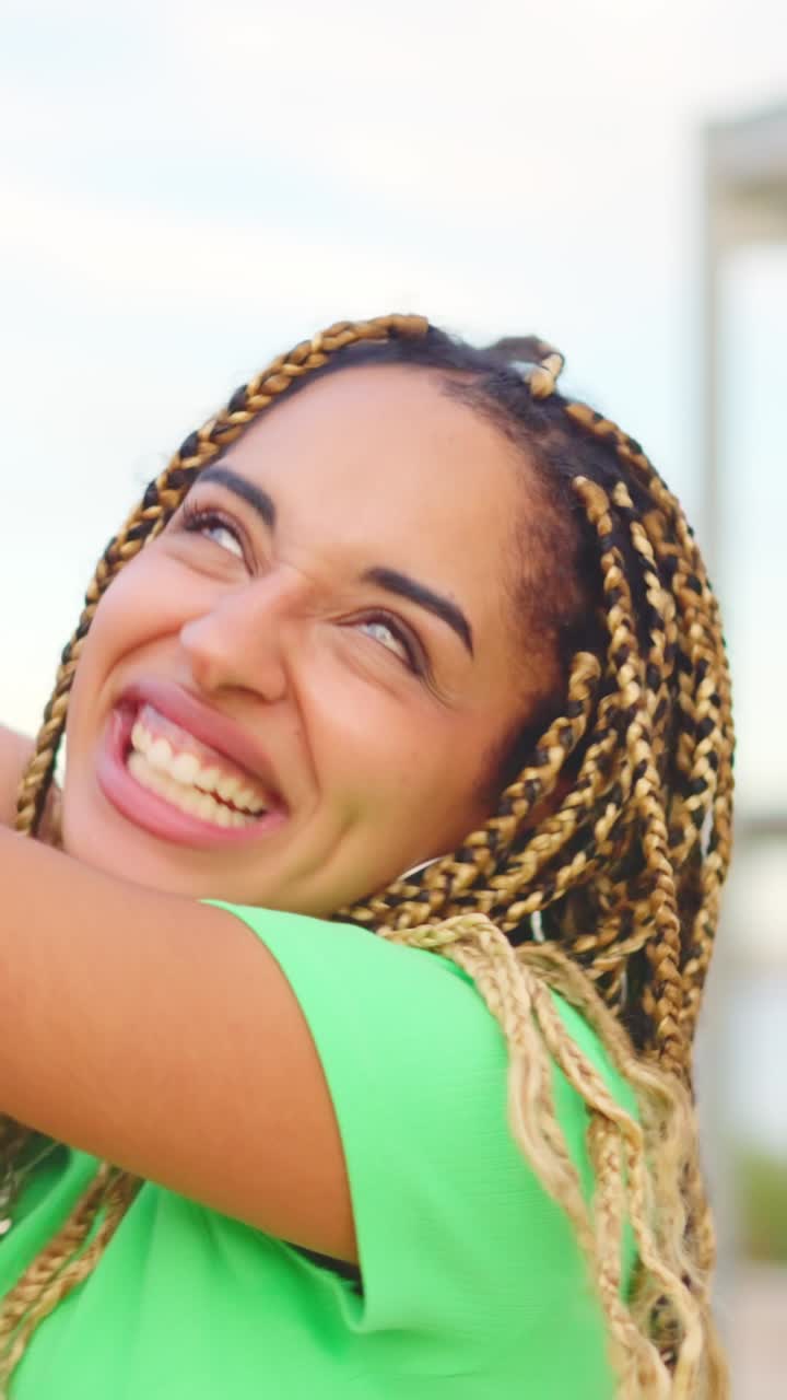 Reunited multi-ethnic friends chatting together in the city street