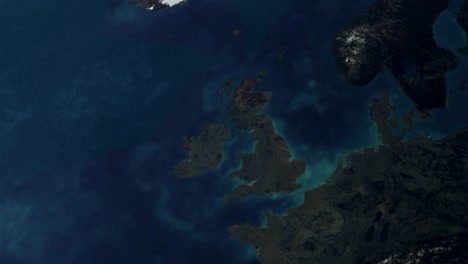 3d earth stylized spinning planet with lens flare sun zoom in to uk great britain