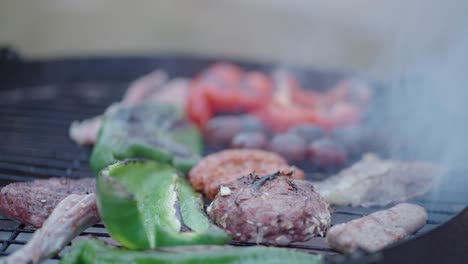 grilled vegetables and meat on barbecue