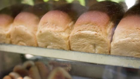 a choon paan seller drives around with his tuk-tuk and sells bread and other bakery products to the locals in colombo