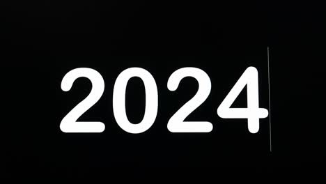 encoding the numbers of the new year 2024 in boldface as shown on a black background of the computer screen to celebrate the coming year