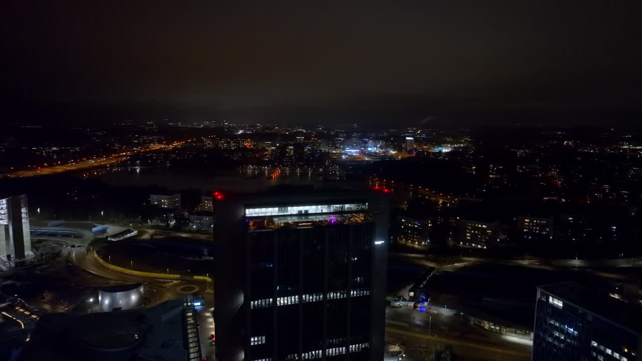 Aerial view over Keilaniemi, revealing the cityscape of Tapiola, Espoo, night