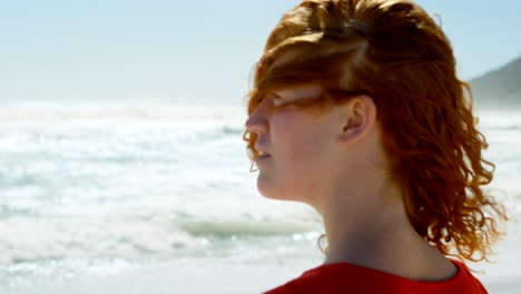 woman looking at beautiful ocean 4k