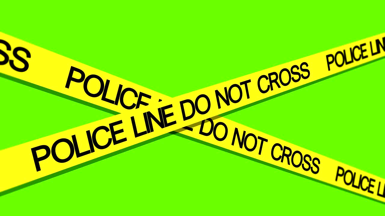 la línea de policía no cruce la cinta agitando en la brisa pantalla verde