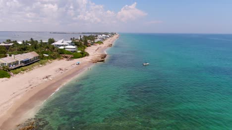 wide aerial panorama of bathtub beach on east coast florida