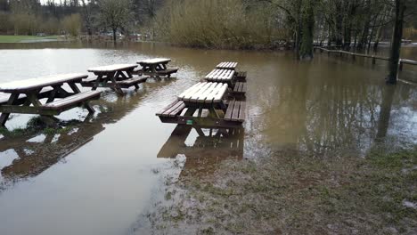 river bollin in wilmslow, cheshire, england, uk after heavy rainfall and bursting its banks