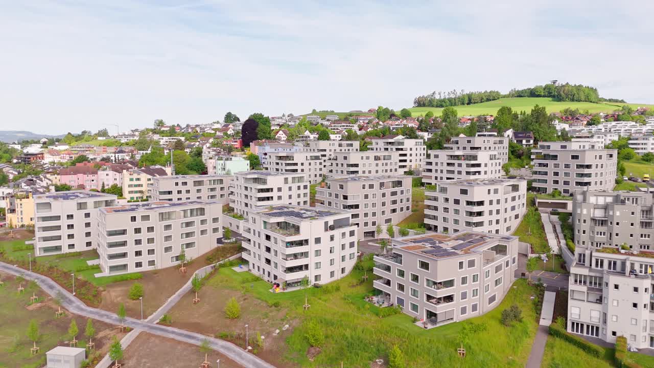 Modern housing complex in Wil, St. Gallen, surrounded by greenery and quiet streets