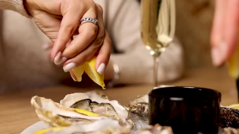 couple enjoying oysters and champagne