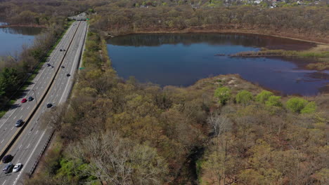 An-aerial-view-of-a-reflective-lake-during-the-day