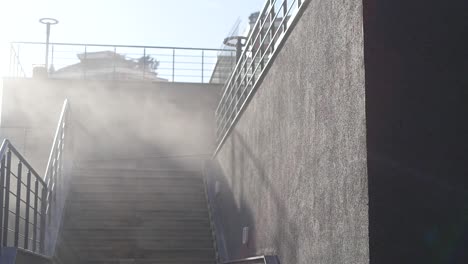 outdoor stairs to rooftop with foggy weather